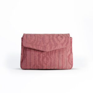 Pink crossbody bag in moiré jacquard with a sleek leather strap, perfect for a feminine touch to any outfit.