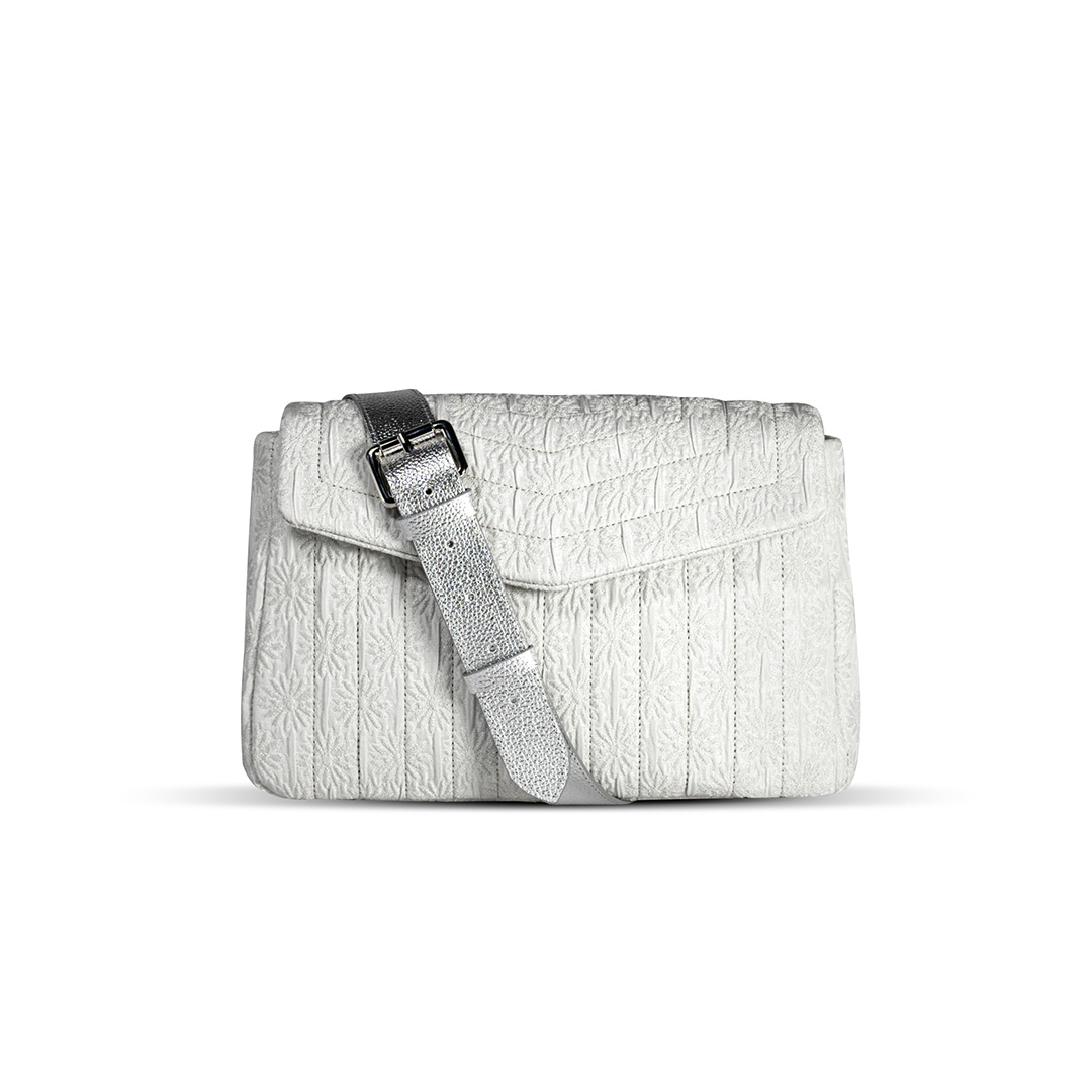 Pearl ivory jacquard crossbody bag with raised daisy pattern and silver leather strap